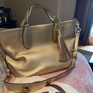 Michael Kors Large Gold Metallic Leather Grab Bag called the “Brooklyn.”